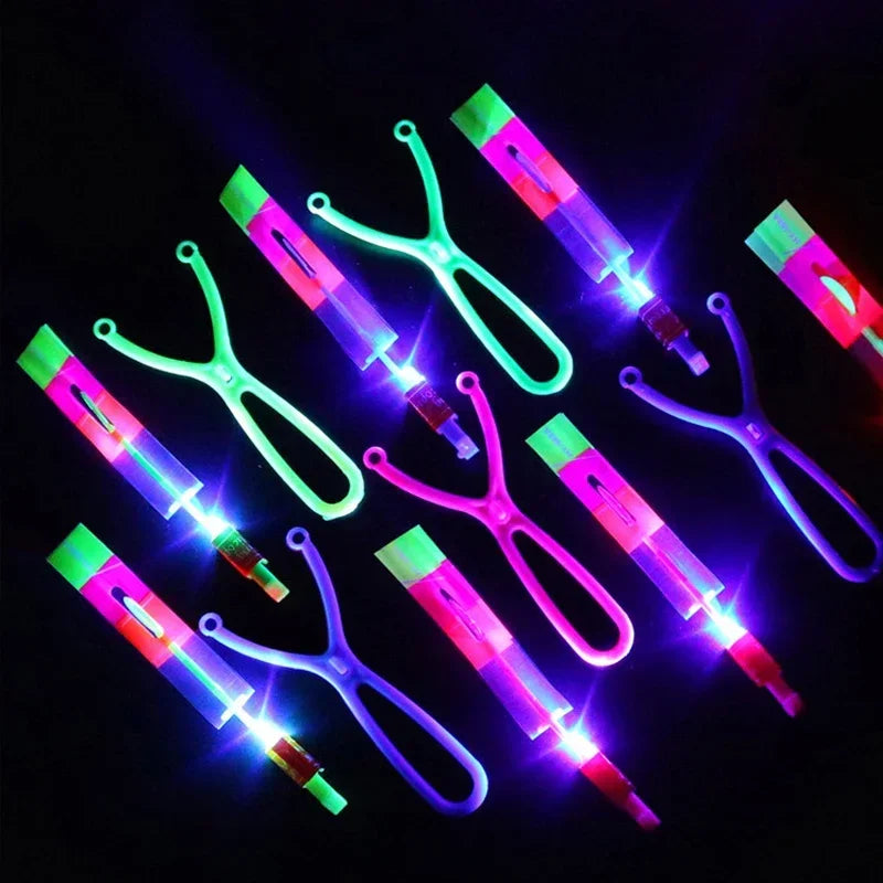 1/3/5/10/20/50/100pcs Amazing Light Toy Arrow Rocket Helicopter Flying Toy LED Light Toys Party Fun Gift Rubber Band Catapult