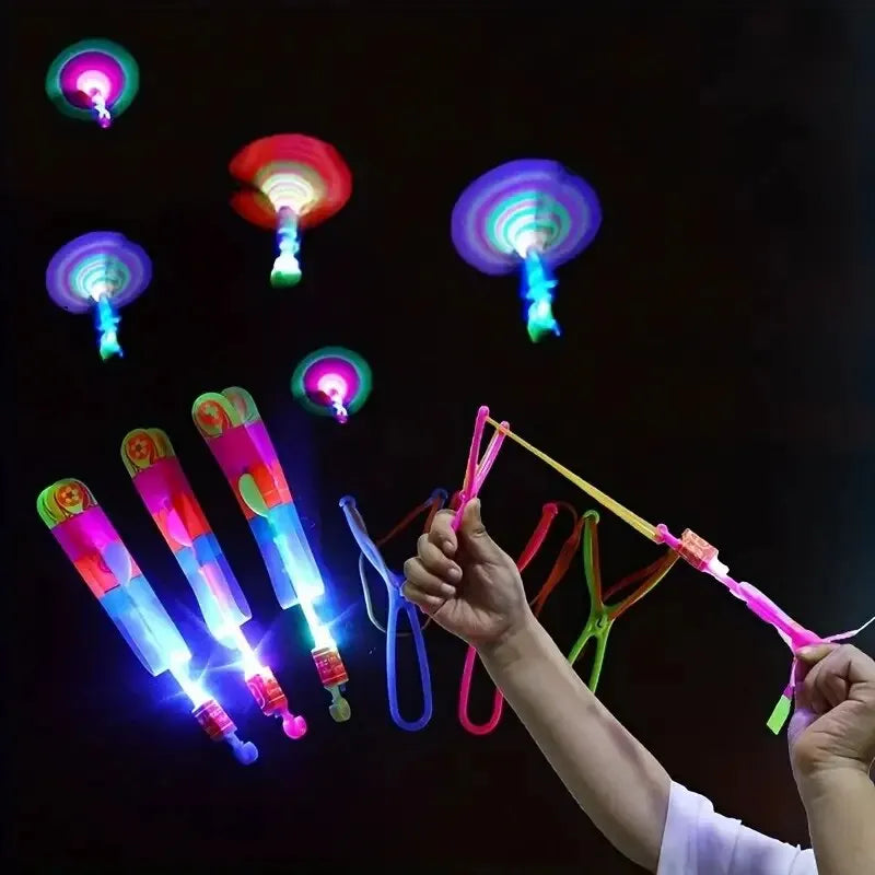 5pcs Amazing Light Toy Arrow Rocket Helicopter Flying Toy LED Light Toys Party Fun Gift Rubber Band Catapult