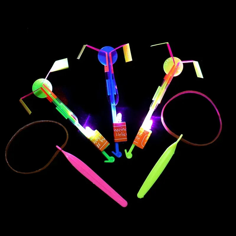 1/3/5/10/20/50/100pcs Amazing Light Toy Arrow Rocket Helicopter Flying Toy LED Light Toys Party Fun Gift Rubber Band Catapult