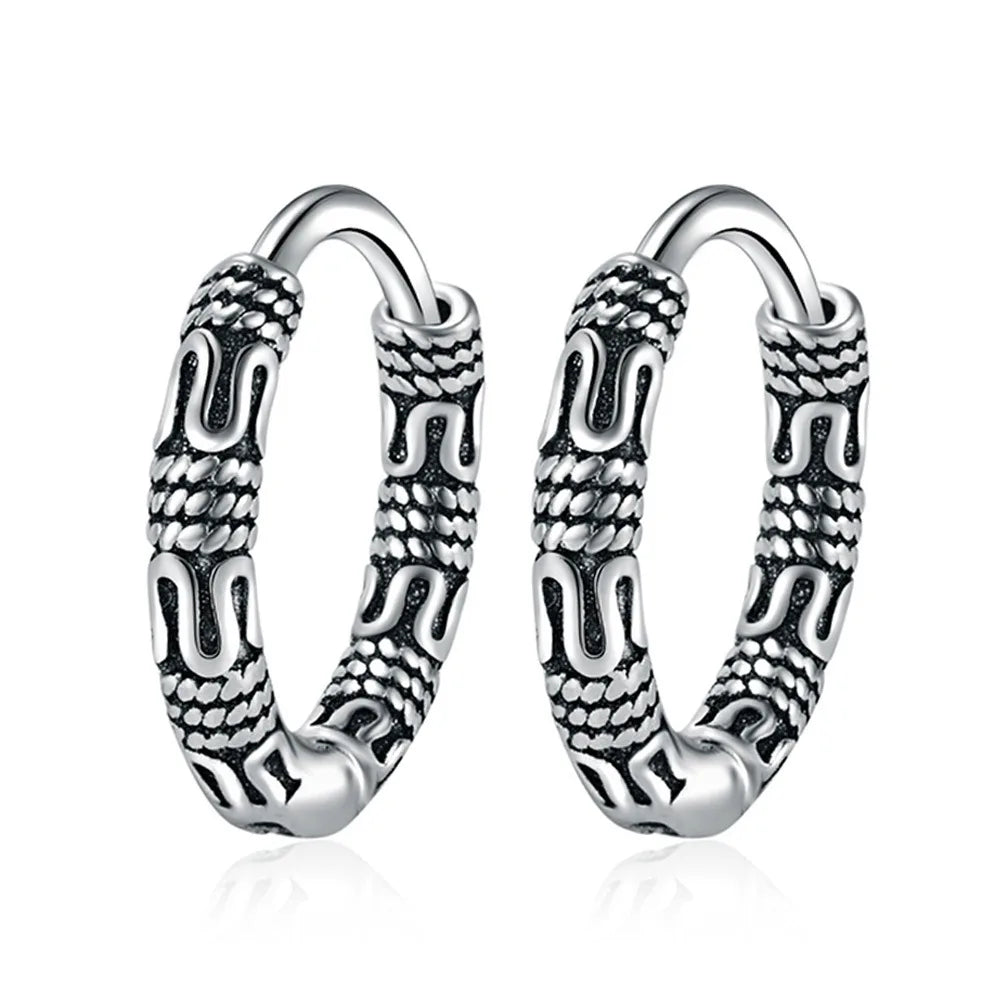 Close-up of Vintage 925 Sterling Silver Hoop Earrings with round pattern design for women.